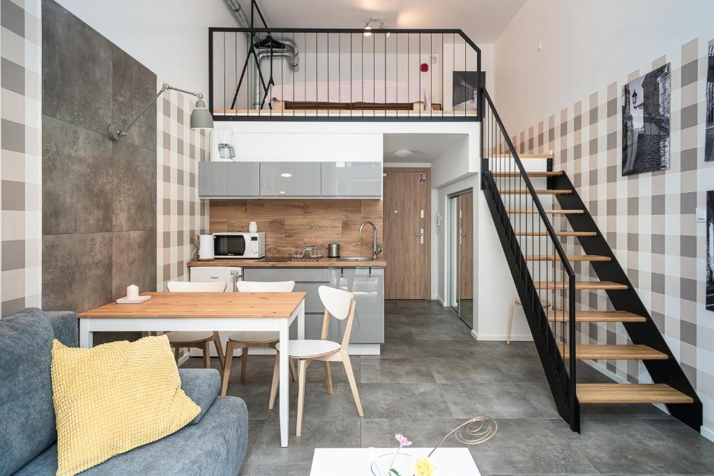 Kuchyňa alebo kuchynka v ubytovaní RentPlanet - Apartamenty Zarembowicza