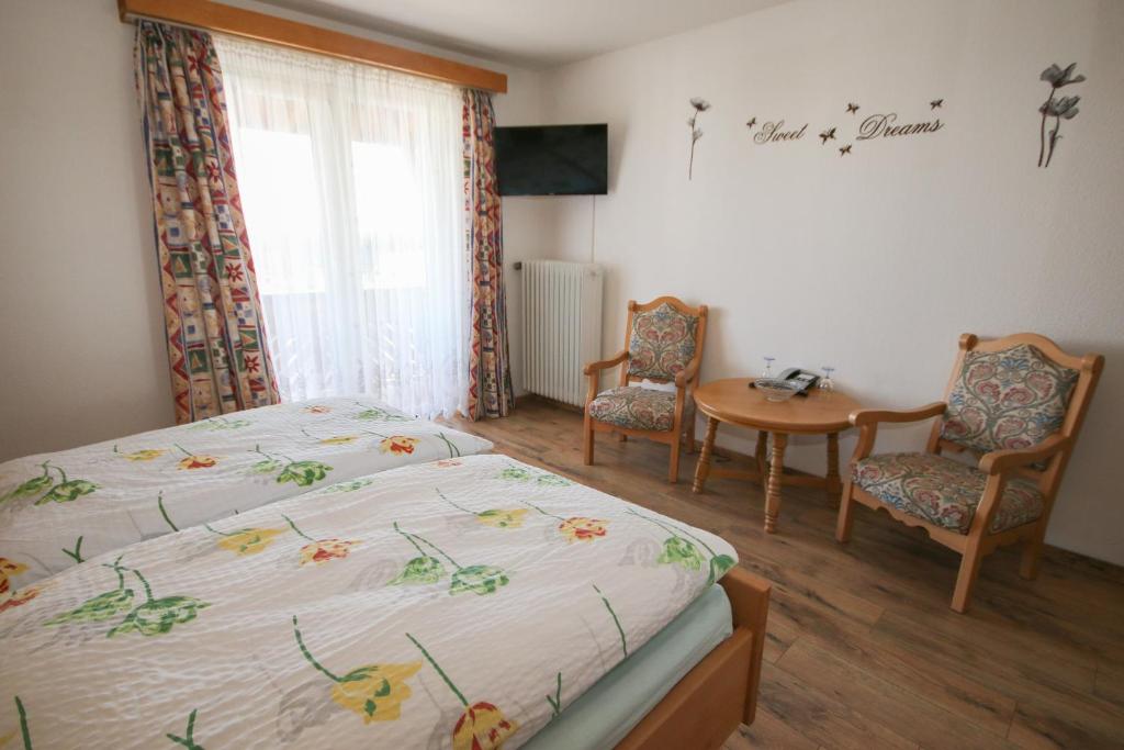 Postel nebo postele na pokoji v ubytování Hotel Charlott