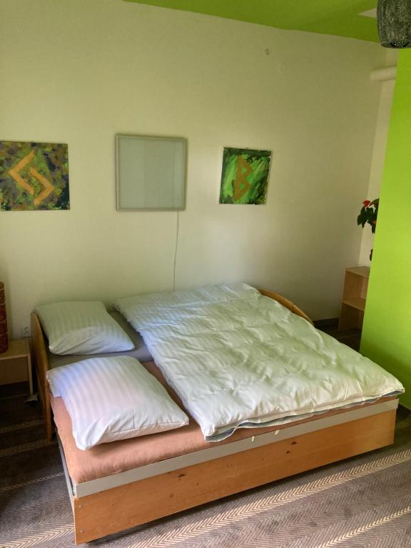 Postel nebo postele na pokoji v ubytování Statek Polánka