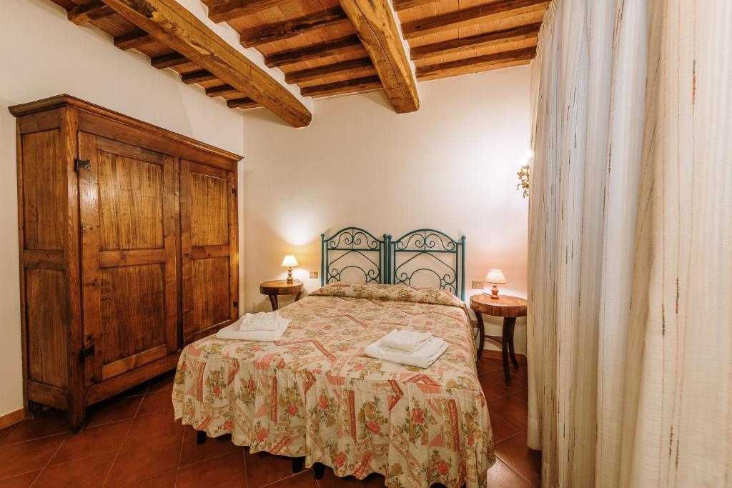 Postel nebo postele na pokoji v ubytování Borgo Villa a Sesta