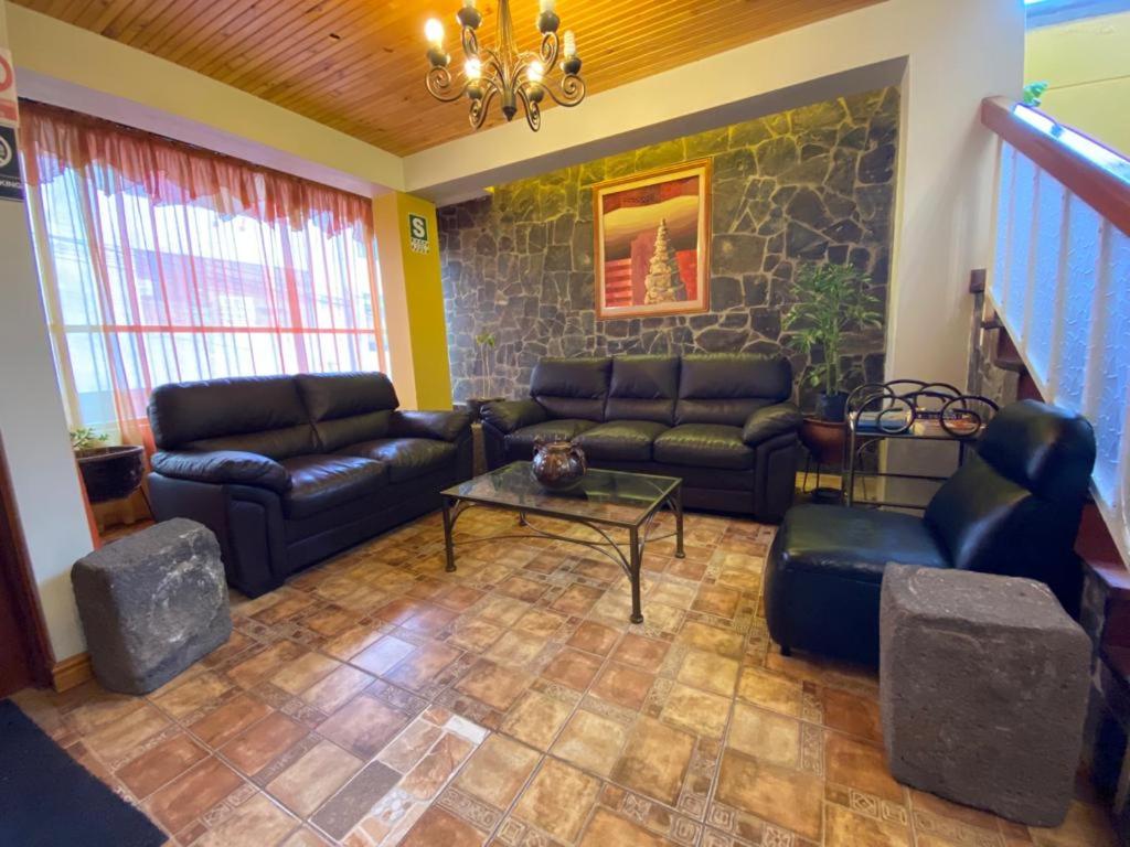 Posezení v ubytování Hostal Oscar Inn