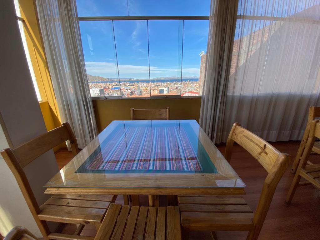Postel nebo postele na pokoji v ubytování Hostal Oscar Inn