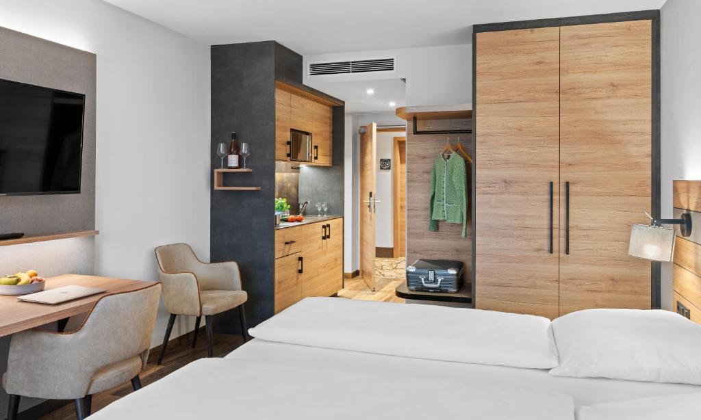 Postel nebo postele na pokoji v ubytování Hotel Seeblick