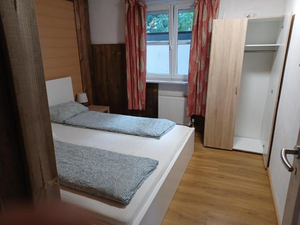 Postel nebo postele na pokoji v ubytování Binderhäusl