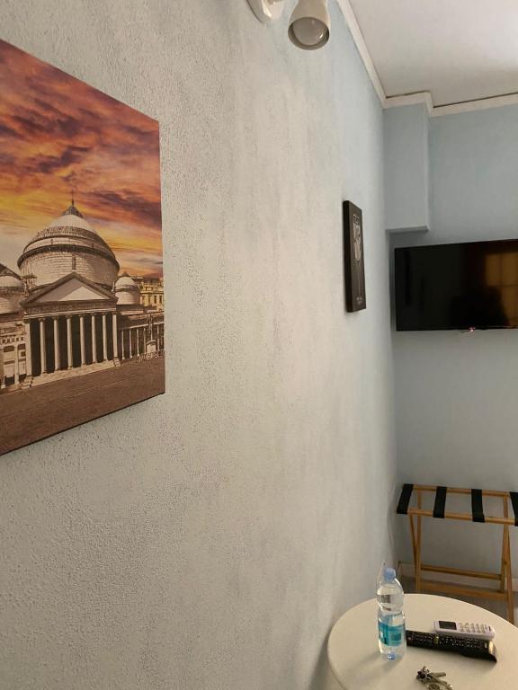 Televízia a/alebo spoločenská miestnosť v ubytovaní Residence Appartamenti Santa Teresa a Chiaia
