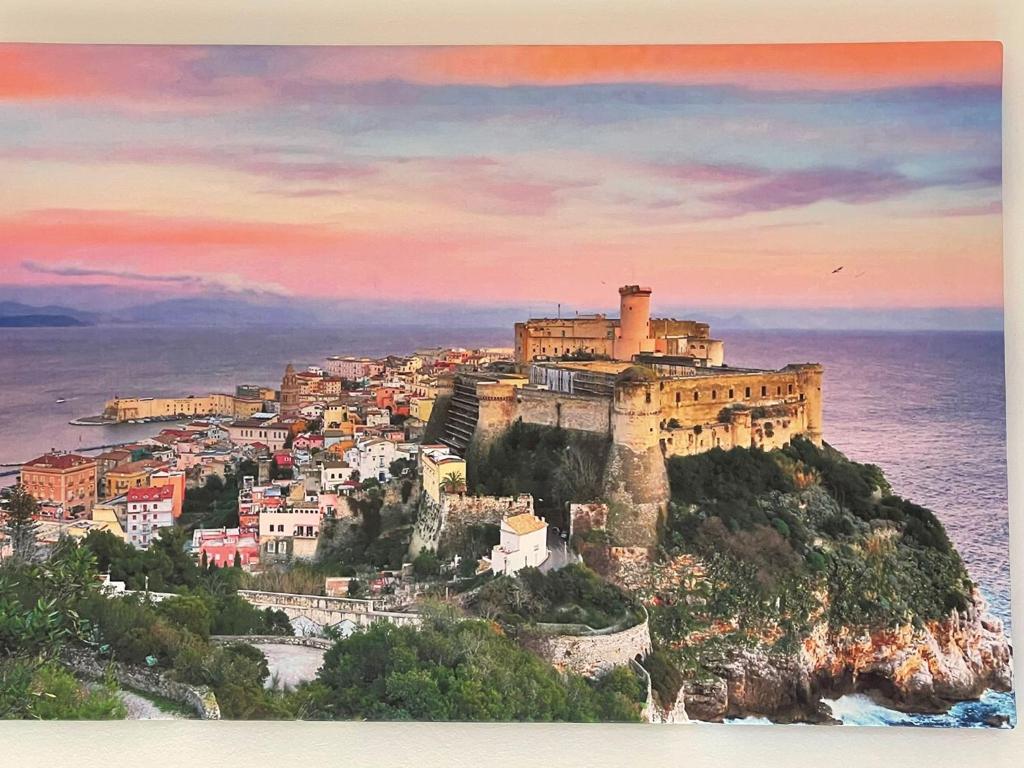 a painting of a city on top of a mountain at L'Armonia in Gaeta