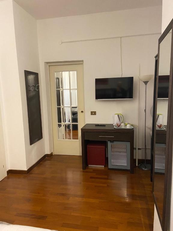 Telewizja i/lub zestaw kina domowego w obiekcie Bed and Breakfast Impruneta28