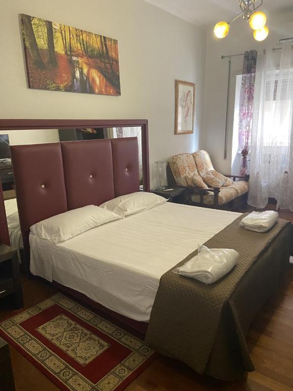 Łóżko lub łóżka w pokoju w obiekcie Bed and Breakfast Impruneta28