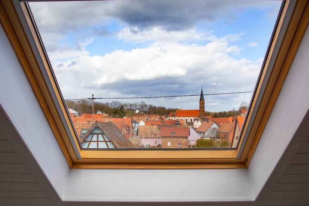 a view of a city from a window in a house at les Toits d'Alsace,F3,2 CH,Adapté au Bébés,Parking in Ettendorf