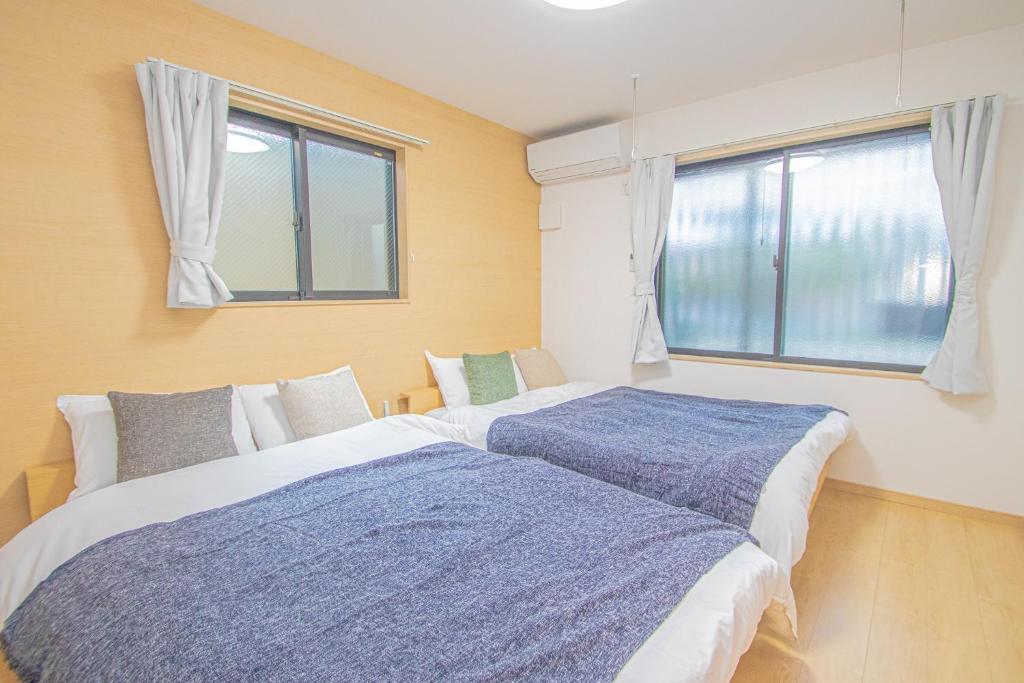 Postel nebo postele na pokoji v ubytování LA CHIC StyleHakata 1 - Vacation STAY 71385v