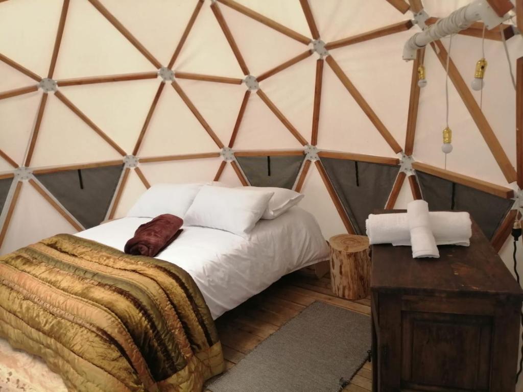 Postel nebo postele na pokoji v ubytování La Meca Glamping