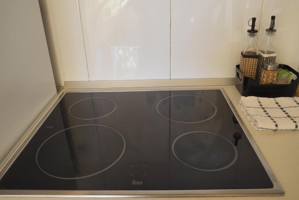 Kuchyň nebo kuchyňský kout v ubytování Apartamento Partara