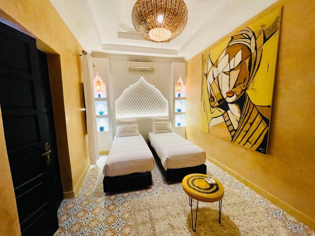 Postel nebo postele na pokoji v ubytování Maison Chafia Boutique Hôtel & Spa