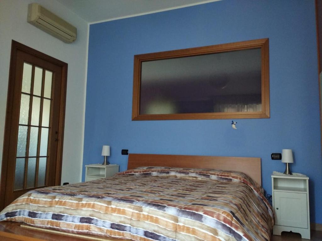 Postel nebo postele na pokoji v ubytování Casa Ada