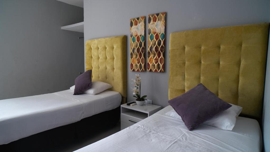 Postel nebo postele na pokoji v ubytování Hotel Boutique Casa Umiña