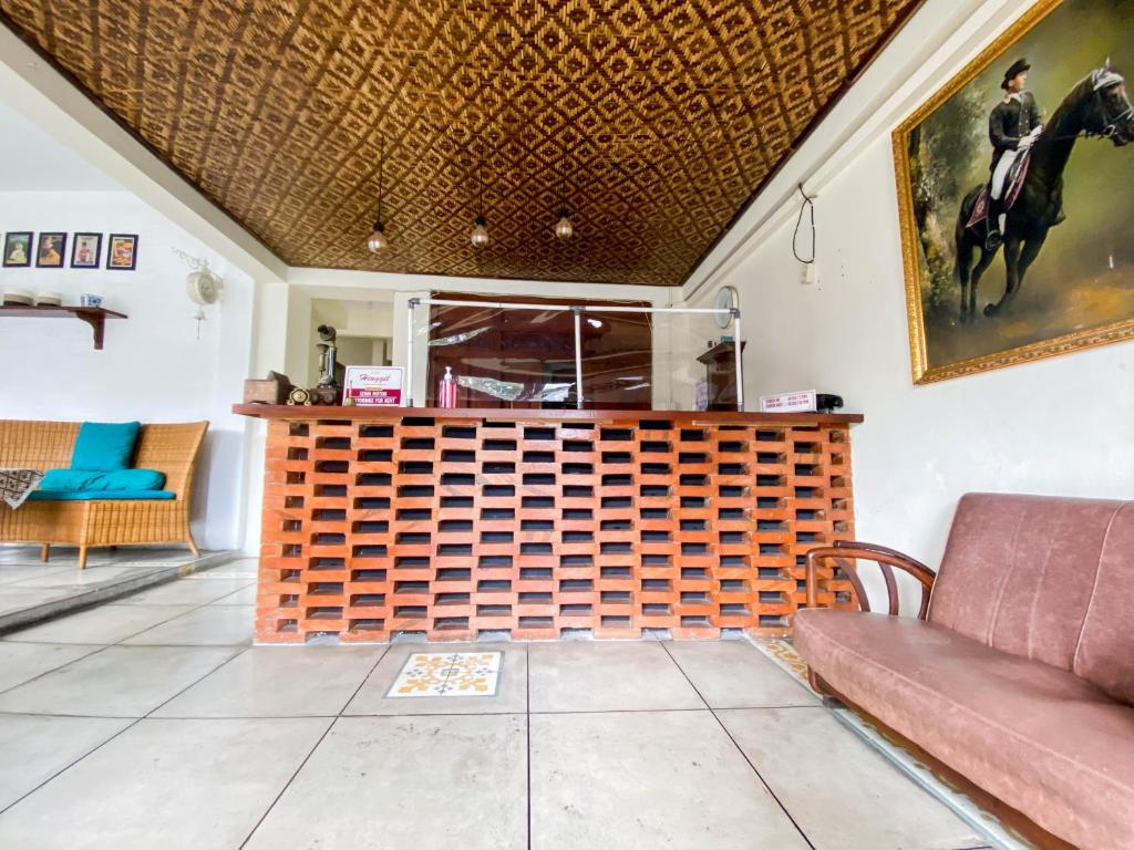 Posezení v ubytování Hinggil Homestay Syariah Malioboro Yogya Mitra RedDoorz