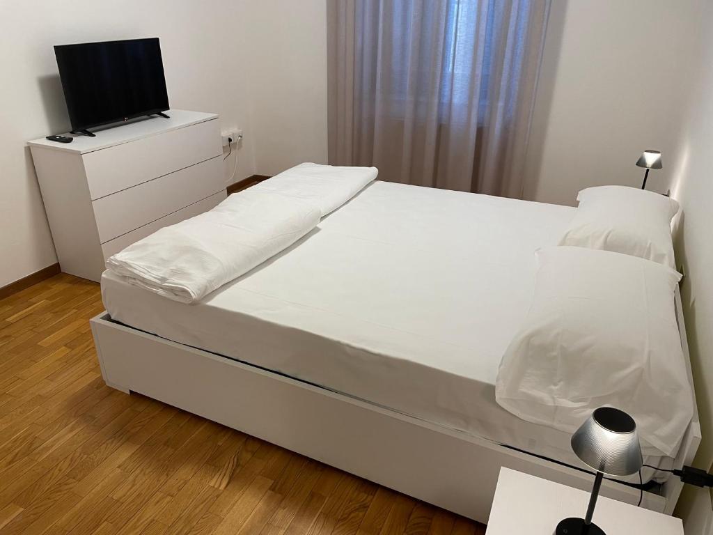 Postel nebo postele na pokoji v ubytování Vecchia Mori