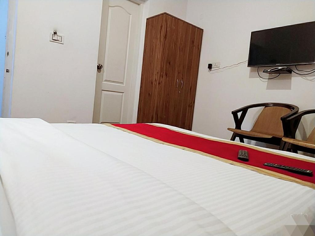 TV a/nebo společenská místnost v ubytování Rosepark Residency