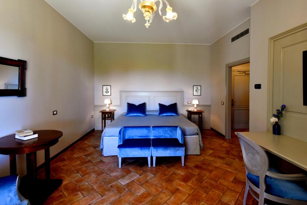Postel nebo postele na pokoji v ubytování Villa Santa Barbara