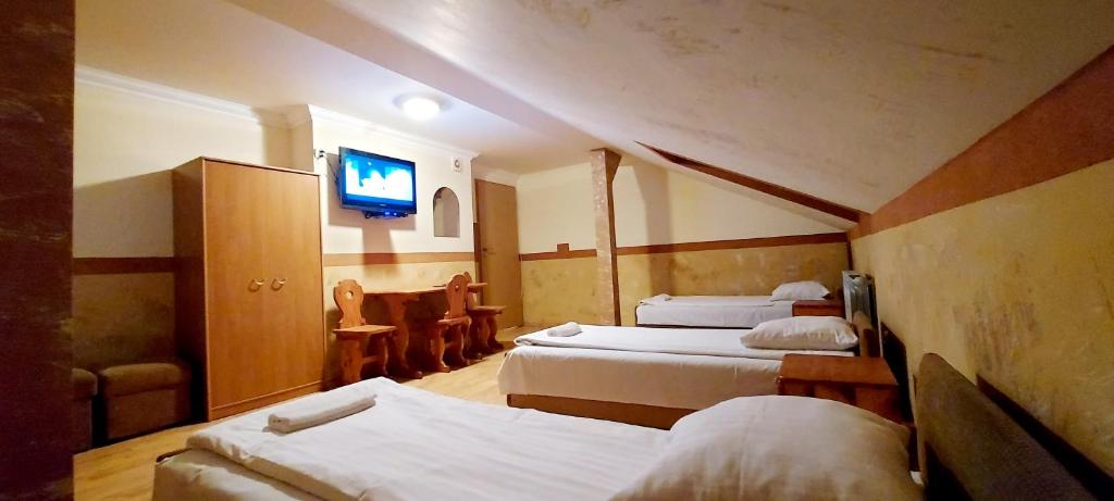 Posteľ alebo postele v izbe v ubytovaní Motel Panorama