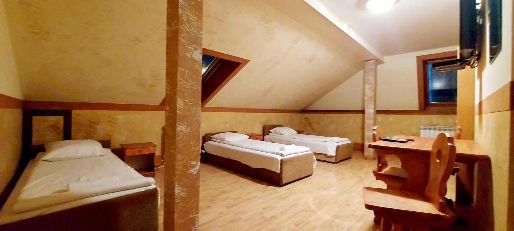 Posteľ alebo postele v izbe v ubytovaní Motel Panorama