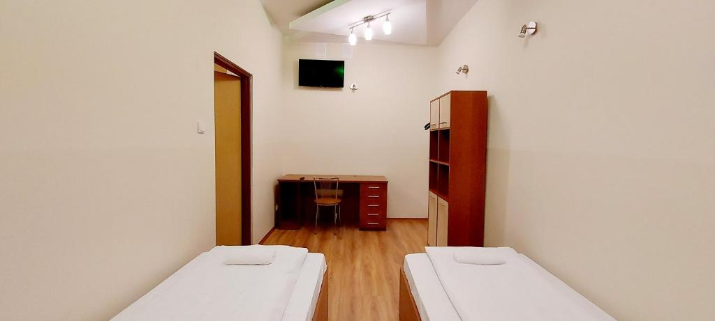Posteľ alebo postele v izbe v ubytovaní Motel Panorama
