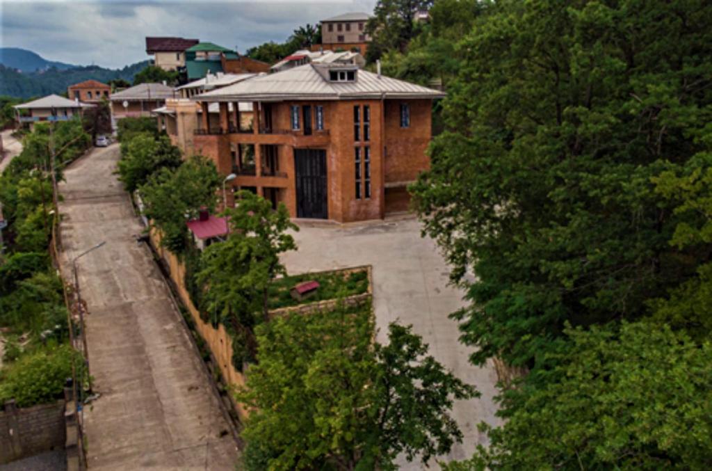 an aerial view of a house in a village at Mango's Guesthouse in Kutaisi
