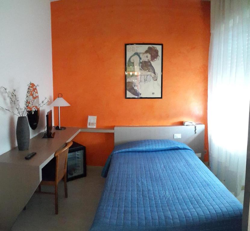 Postel nebo postele na pokoji v ubytování Cavalieri del Tau