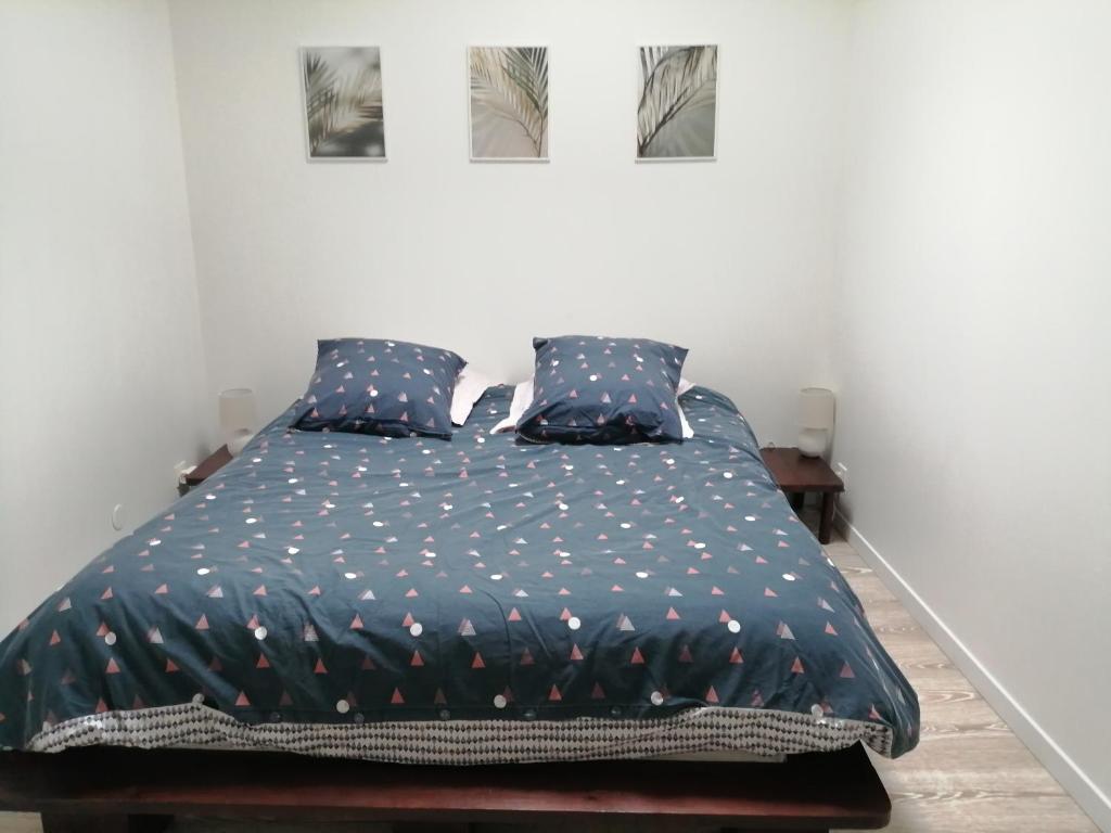 Postel nebo postele na pokoji v ubytování Appart'Hôtel Lagnieu