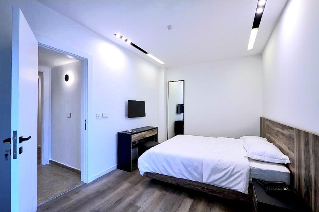 Postel nebo postele na pokoji v ubytování Loft 29 Residence