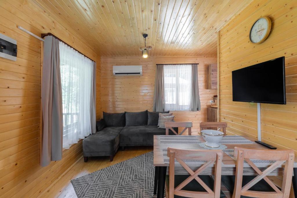 TV a/nebo společenská místnost v ubytování LAGUN POOL VILLAGE