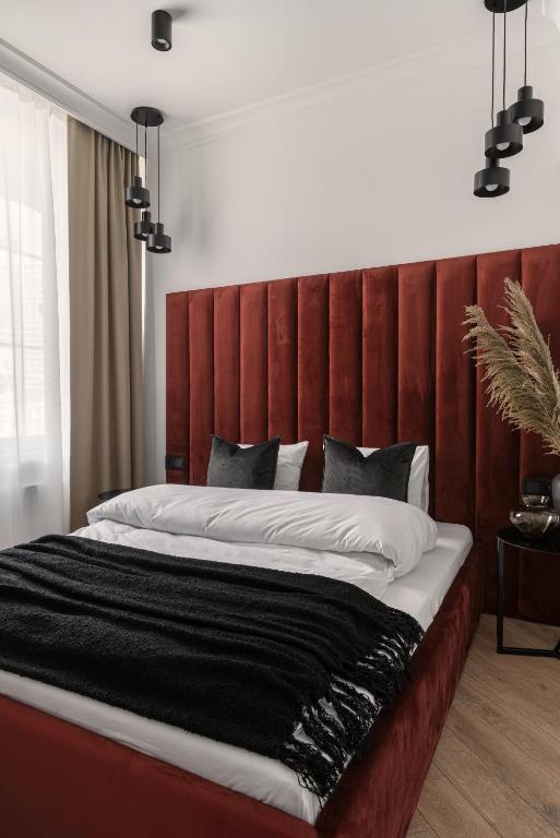 Posteľ alebo postele v izbe v ubytovaní APARTIO ROOMS Katowice