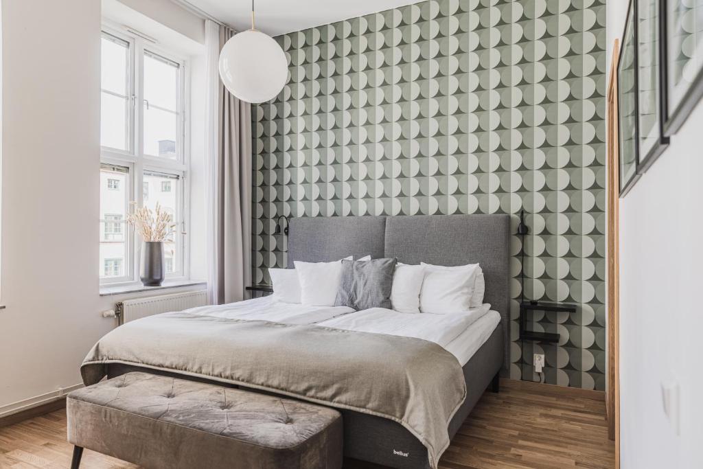 Un ou plusieurs lits dans un hébergement de l'établissement The More Hotel Mazetti