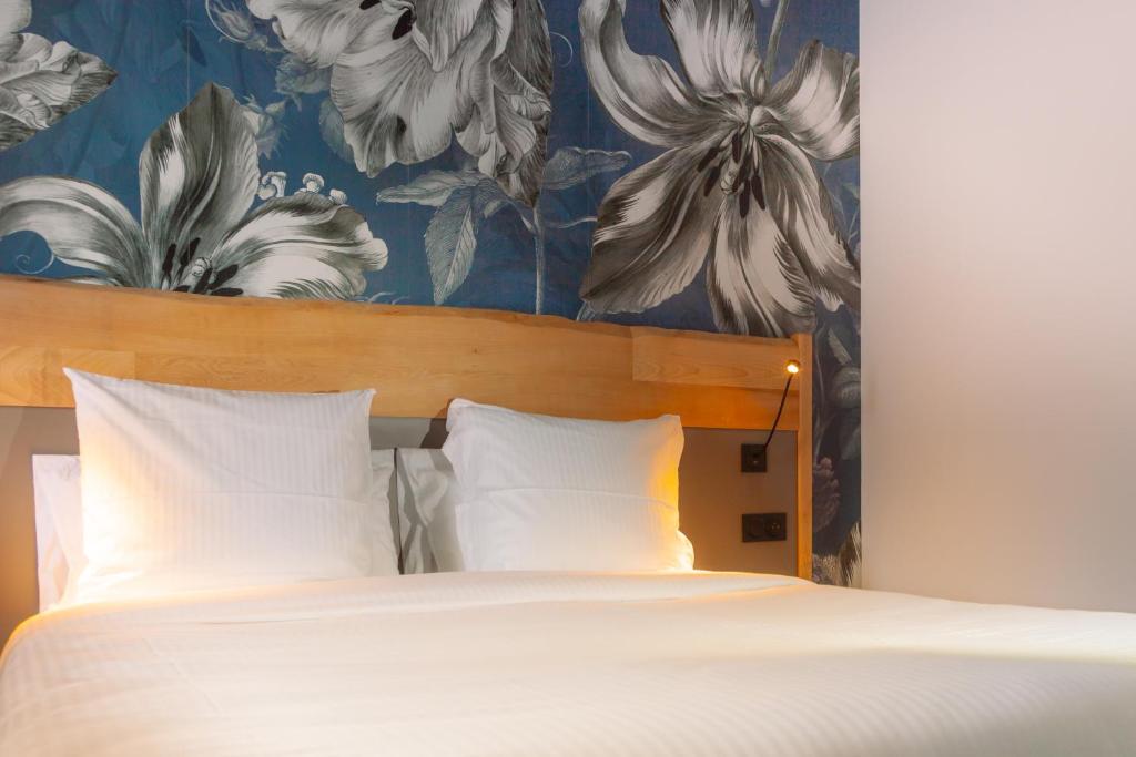 Postel nebo postele na pokoji v ubytování Berti Hotel - Mulhouse Centre Gare