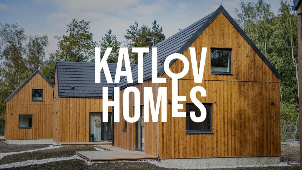 a house with a sign that reads khalil homes at Katlov Homes in Červené Janovice