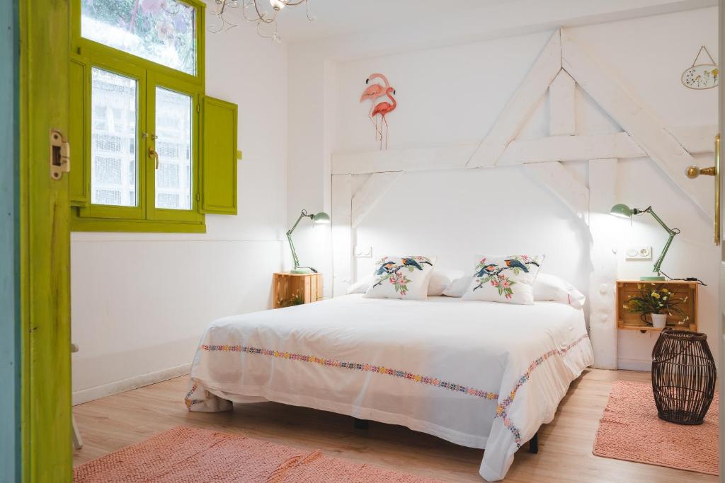 Postel nebo postele na pokoji v ubytování Apartamentos LÓRIEN Zarautz