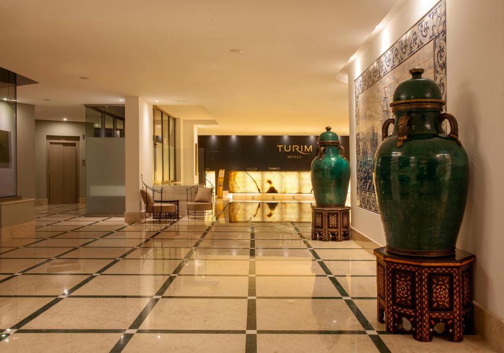 Een TV en/of entertainmentcenter bij TURIM Presidente Hotel
