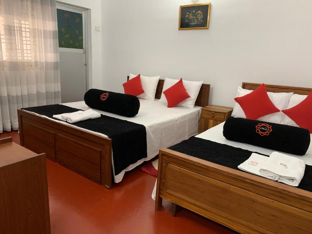 Postel nebo postele na pokoji v ubytování Sobha Holiday Home