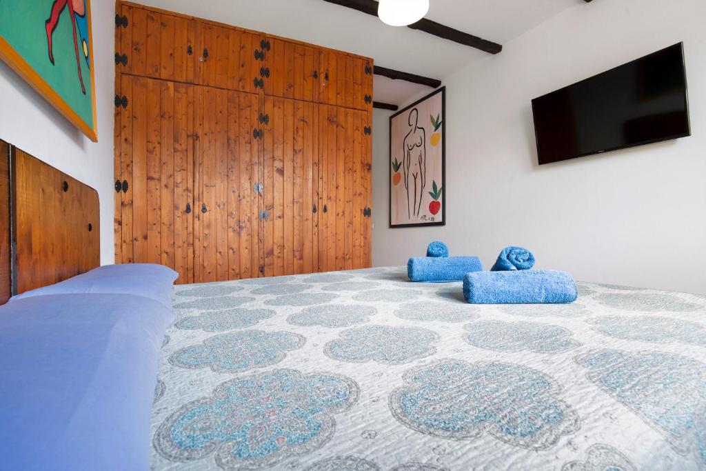 Posteľ alebo postele v izbe v ubytovaní Las Casitas 28