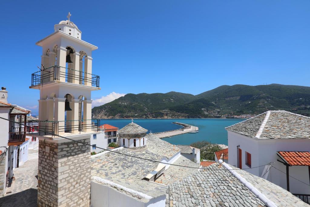 a view of the water from the roofs of buildings at Skopelos house in Castle in Panormos Skopelos