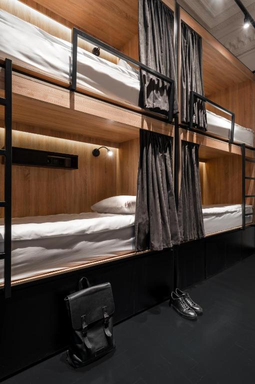 Postel nebo postele na pokoji v ubytování Globe Runner Hostel