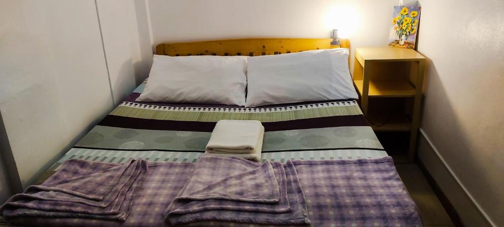 Letto o letti in una camera di Mapping Hostel
