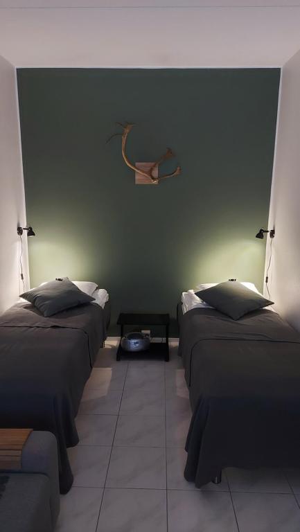 Katil atau katil-katil dalam bilik di Ylläs Kanerva 107