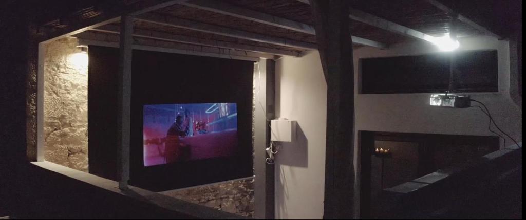 TV a/nebo společenská místnost v ubytování Aiolos Suite