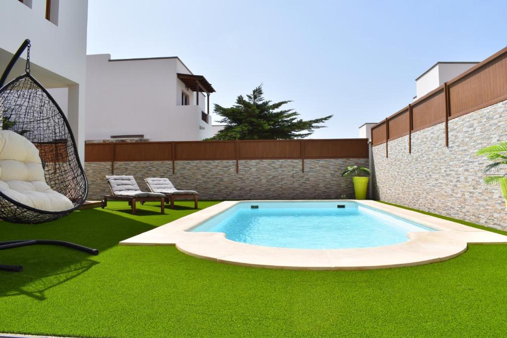 Bazén v ubytování Tilley. Private Villa nebo v jeho okolí