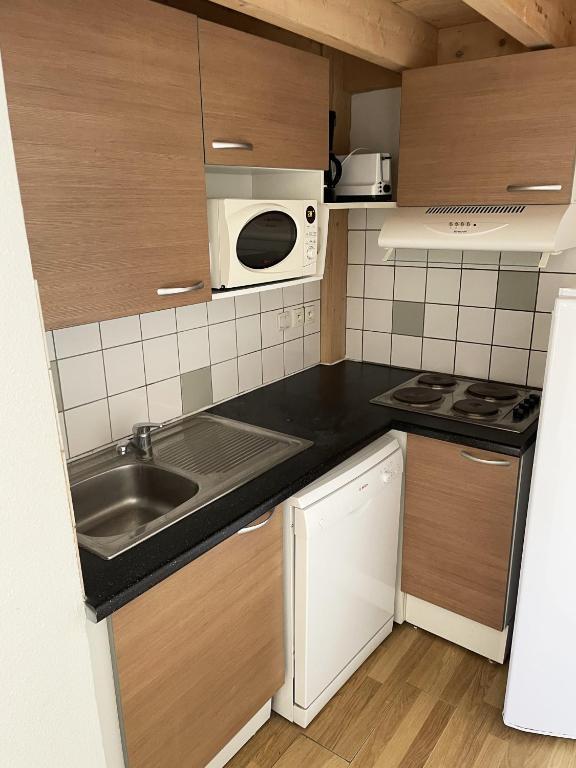 Kuchyň nebo kuchyňský kout v ubytování Olydea Oleron les Sables Vignier