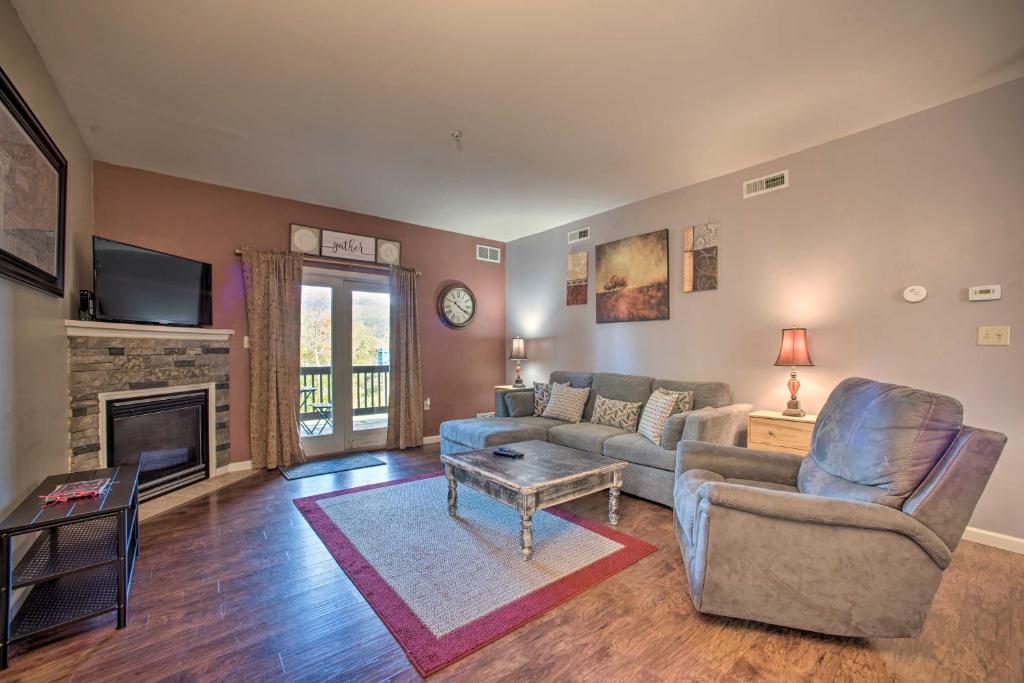 a living room with a couch and a fireplace at Hunter Mountain Ski Retreat - Steps to Lift! in Hunter