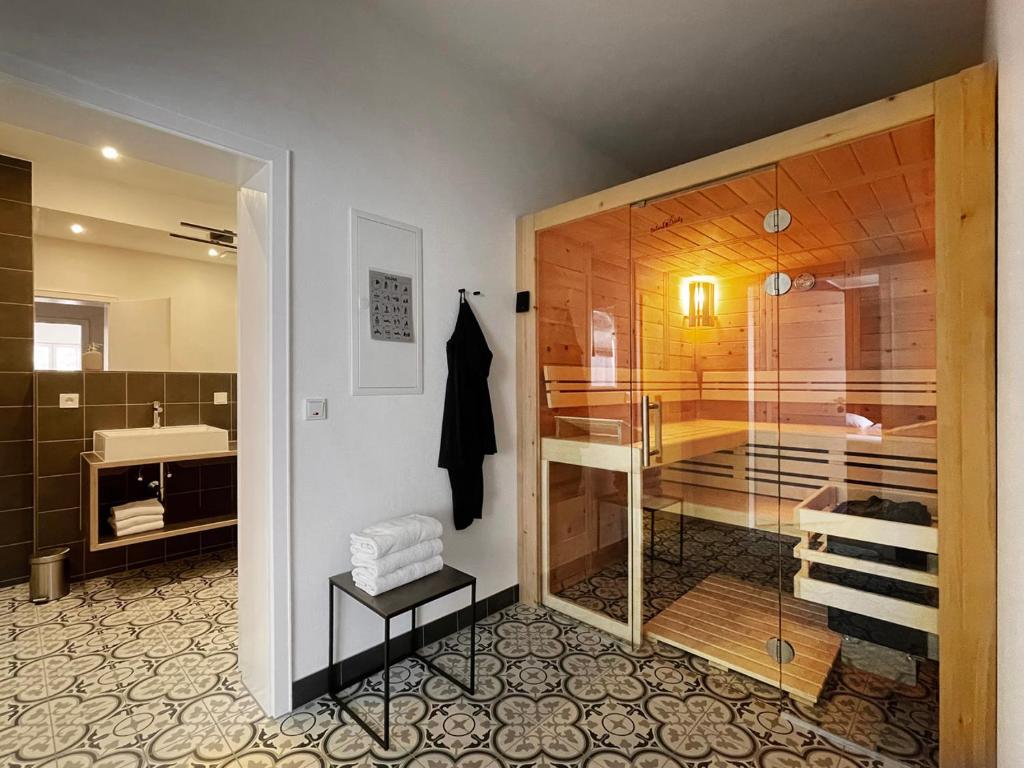 a bathroom with a shower and a sink at Villa Burglay in Zell an der Mosel