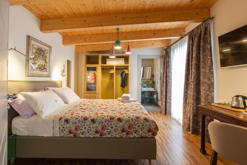 Postel nebo postele na pokoji v ubytování d'ARTEmisia Chambres d'hôtes