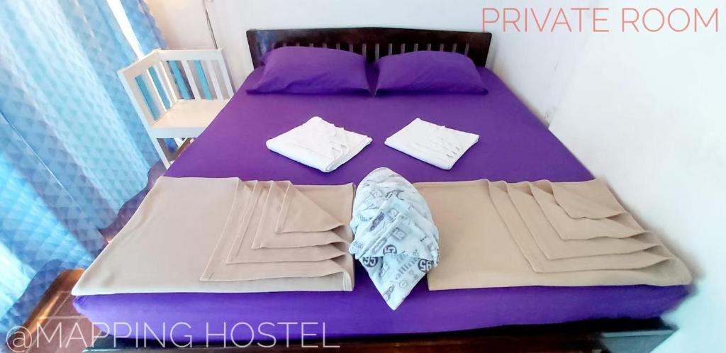 Letto o letti in una camera di Mapping Hostel